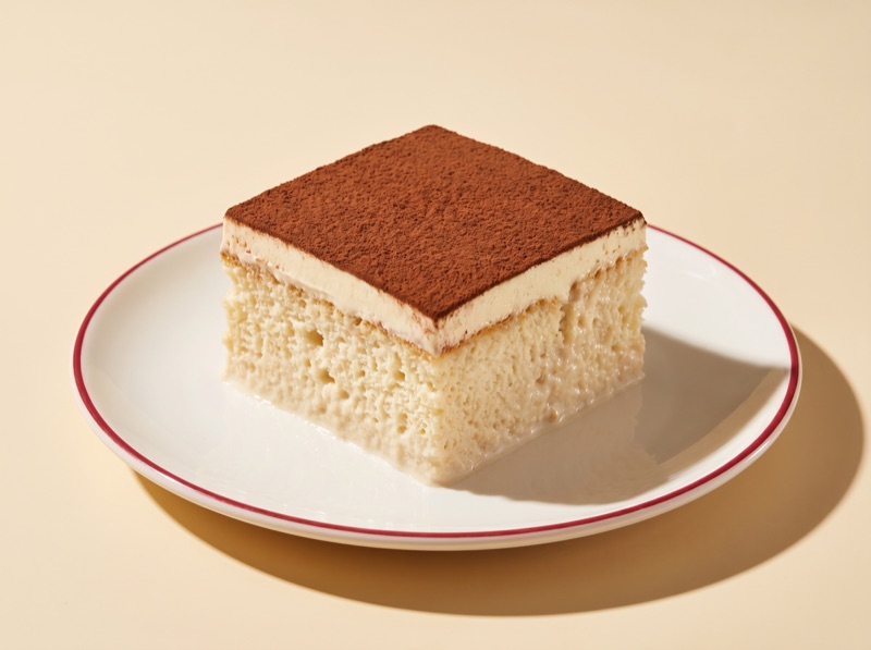 A tiramisu three-milk cake at Ruma, comparing trilece vs tres leches in Amsterdam