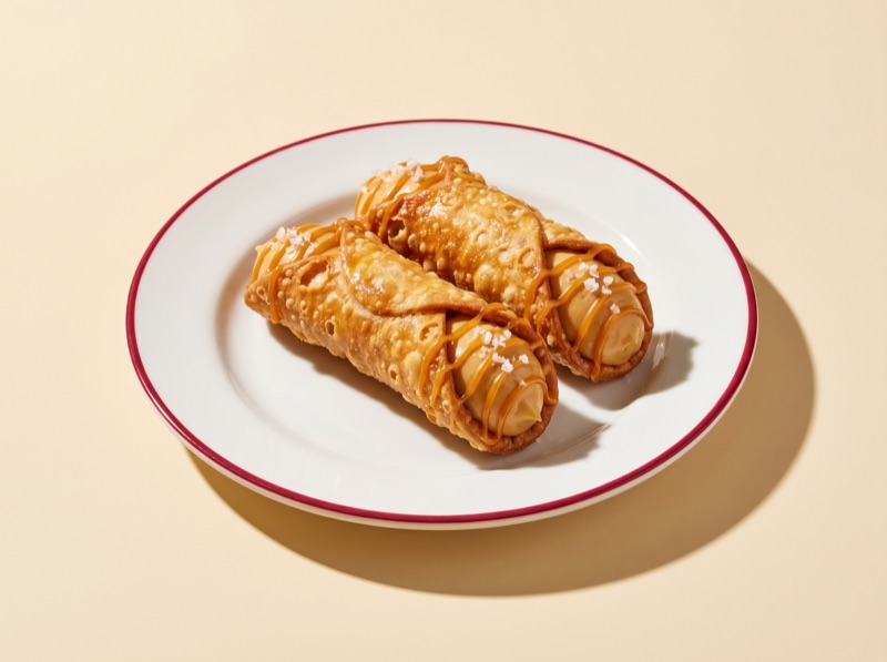 A caramel sea salt cannoli at Ruma, a sweet counterpart to the best stroopwafels in Amsterdam